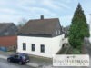 Potenzialreiches Zweifamilienhaus auf ca. 800 m² Sonnengrundstück mit 3 Garagen in Mülheim Speldorf - Titel
